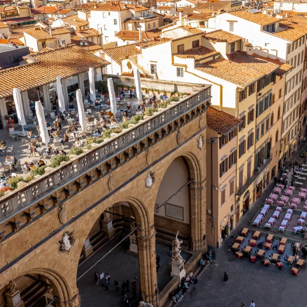 a large courtyard with buildings around it