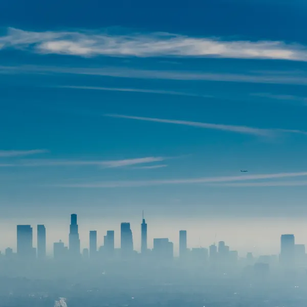 a city skyline with clouds