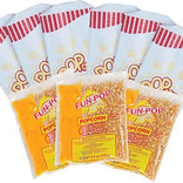 Multiple bags of Furpop popcorn kernels with red and white striped tops and yellow labels.