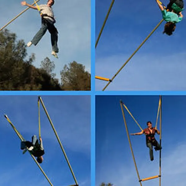 Four images of people performing aerial flips on a trampoline bungee setup against a clear blue sky.