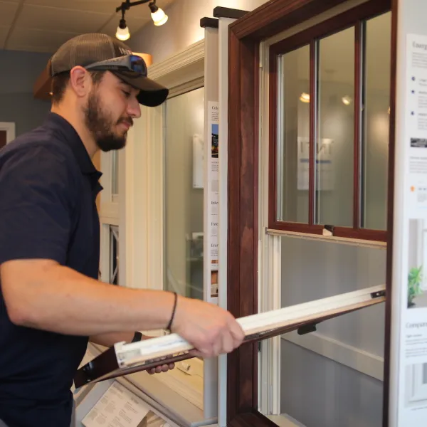 How to put a window sash back in place