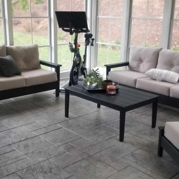 a living room with a couch and coffee table