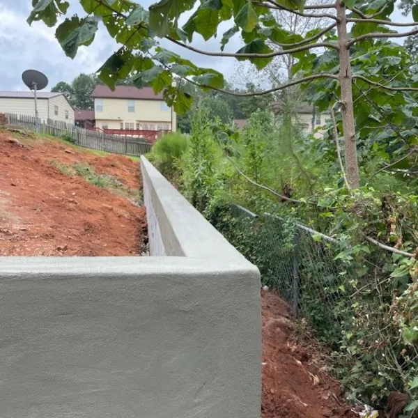 a path with a fence and trees