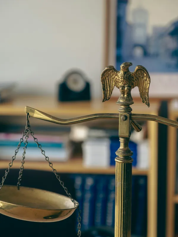 a bird statue on a table