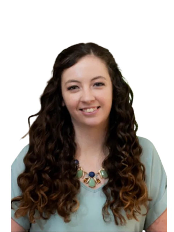 a person with long hair smiling