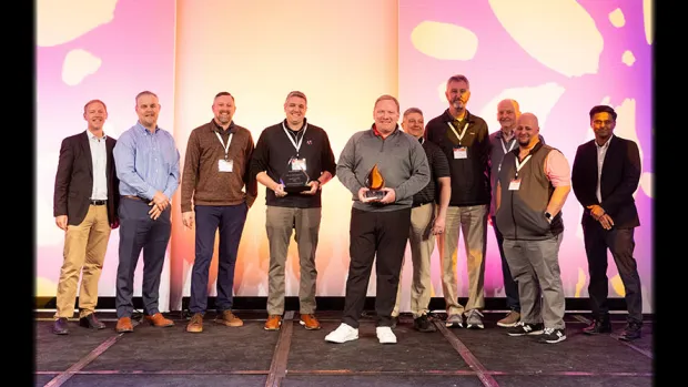 Georgia Spa Company accepts the North American Dealer of the Year Award from Caldera Spas