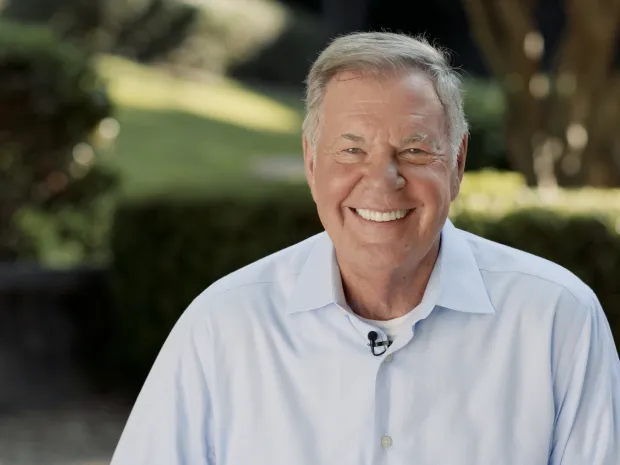 a man smiling for the camera