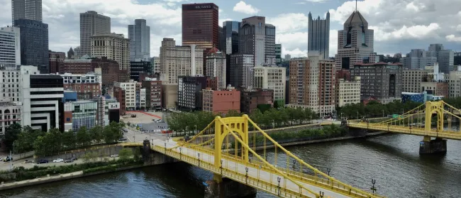 a bridge over a river in a city