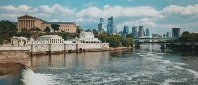 a body of water with buildings along it