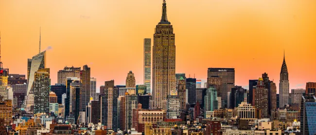 Empire State Building with tall buildings