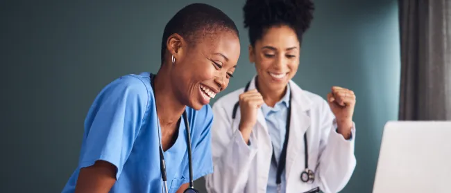 a doctor showing a patient something on the tablet