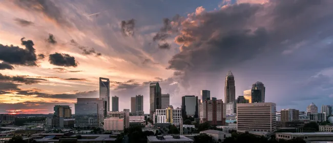 a city skyline at sunset