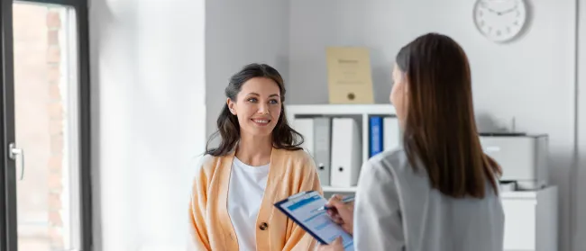 a woman holding a tablet