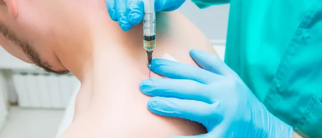 a dentist examining a patient's teeth