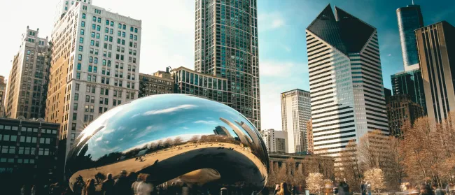 a large reflective sphere in Millennium Park