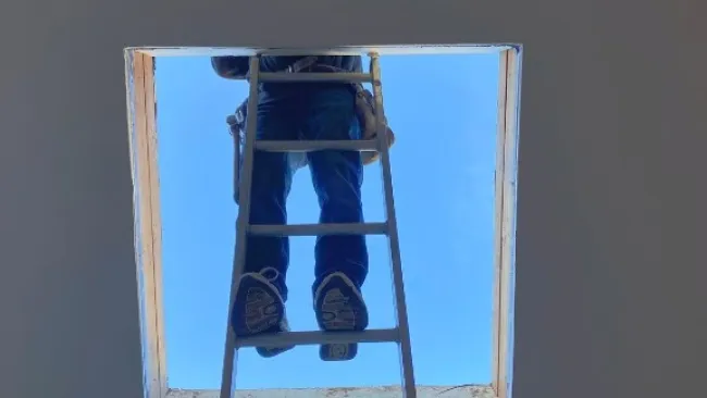 contractor installing a skylight in an Atlanta home