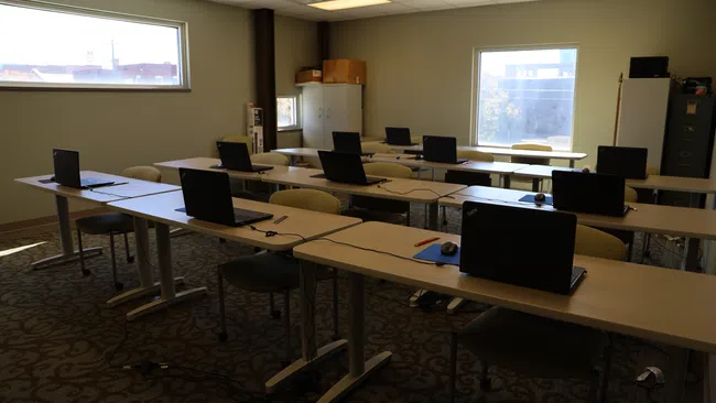 a room with tables and chairs