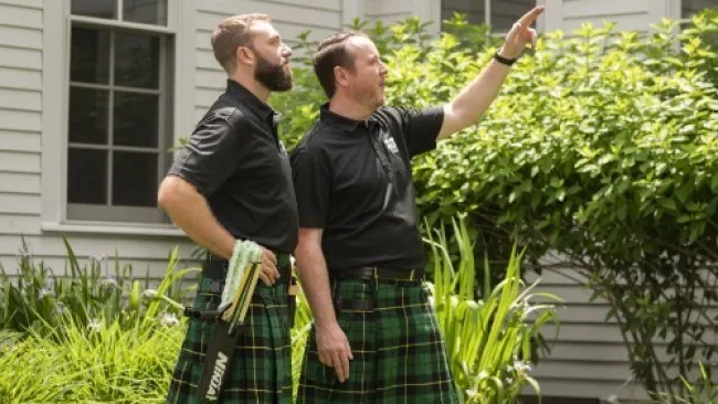 two men in kilts