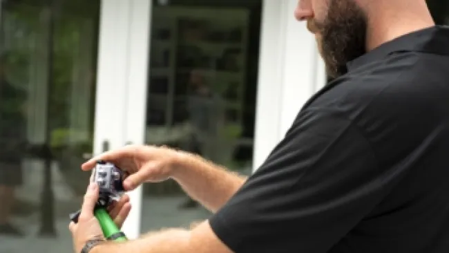 a man holding a camera