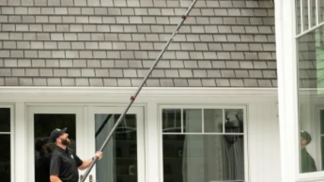 a man holding a pole