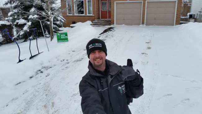 Anthony Brock standing in the snow