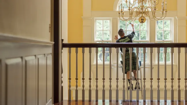 a man and a woman standing on a balcony