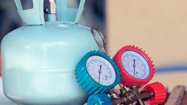 a blue and red alarm clock