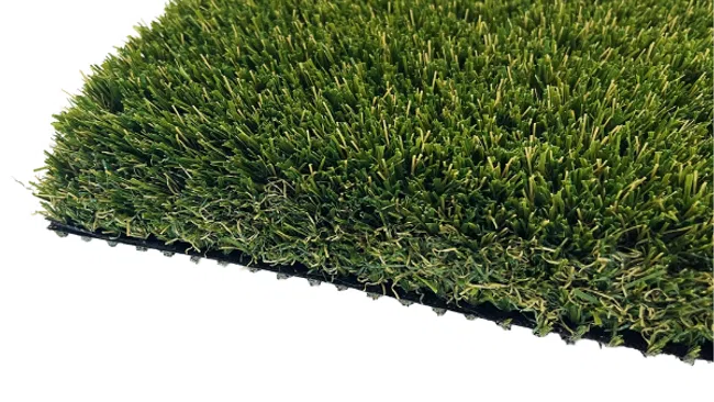 Close-up of a green artificial grass turf sample with dense blades and black backing.