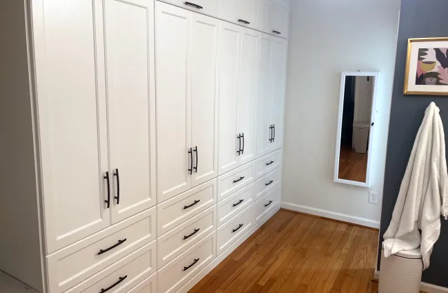 a white cabinet in a room