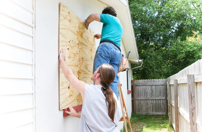 a person painting a wall