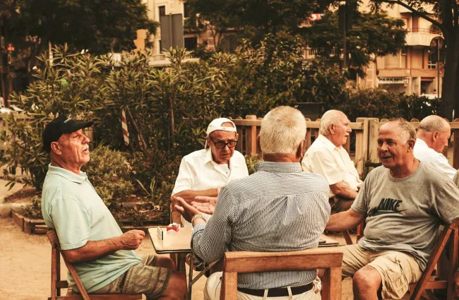 a group of people sitting outside