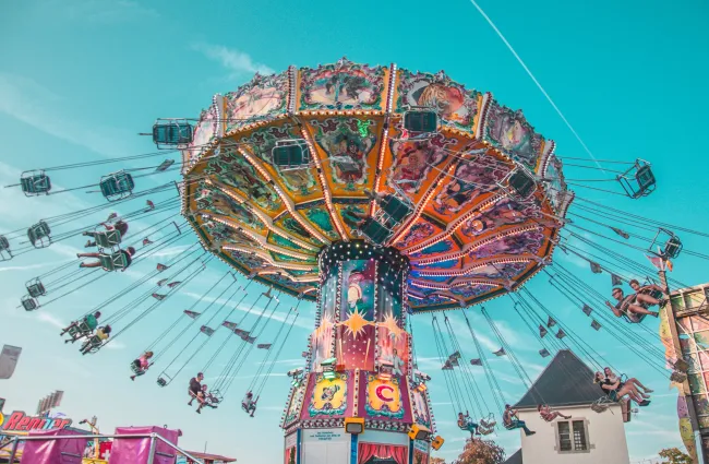 a ferris wheel with people on it