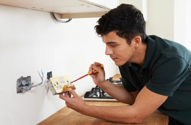 a man working on a toy