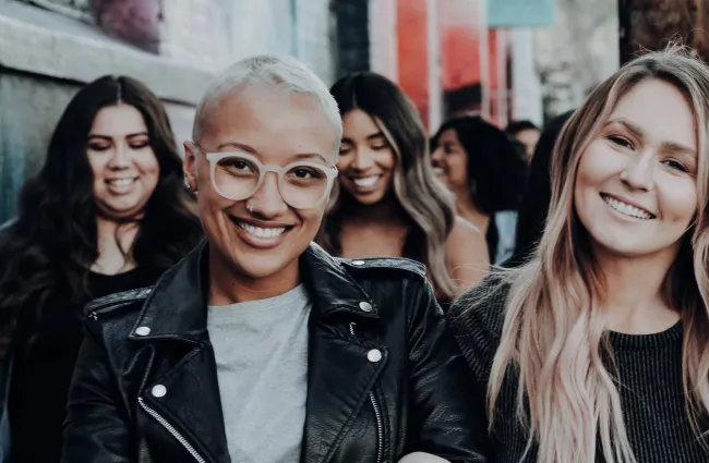 a group of people posing for a photo