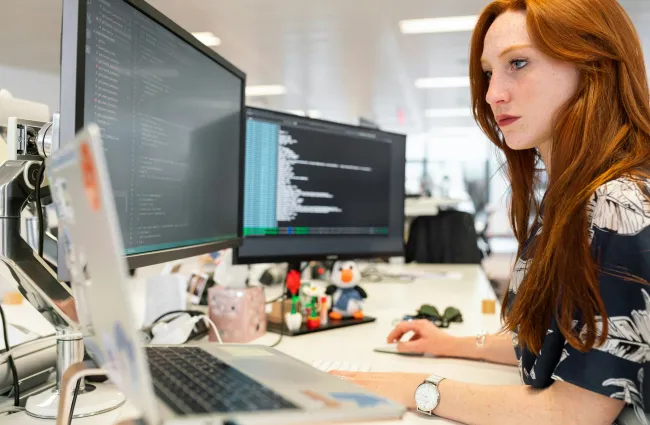 a woman working on a computer