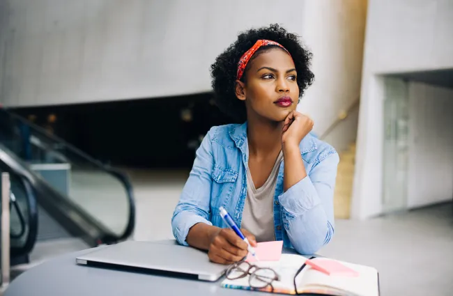 Woman thinking about filing for divorce.