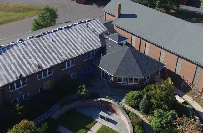 connecticut commercial building with roof replacement in progress