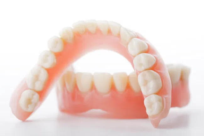 Implant Dentures vs. Regular Dentures: What You Need to Know