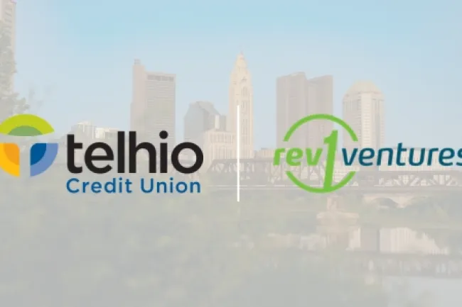 Logos of Telhio Credit Union and Rev1 Ventures over a city skyline background.