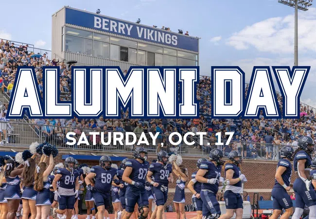 Berry Vikings football team and cheerleaders on field with packed stadium behind for Alumni Day event.