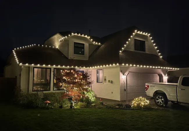 a house with a truck parked in front of it