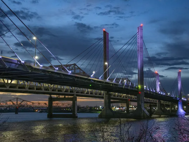 a bridge with lights at night