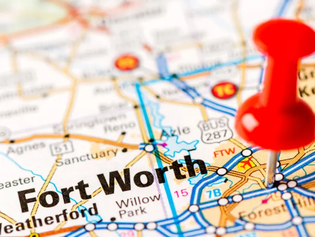Close-up of a map highlighting Fort Worth with a red pushpin.