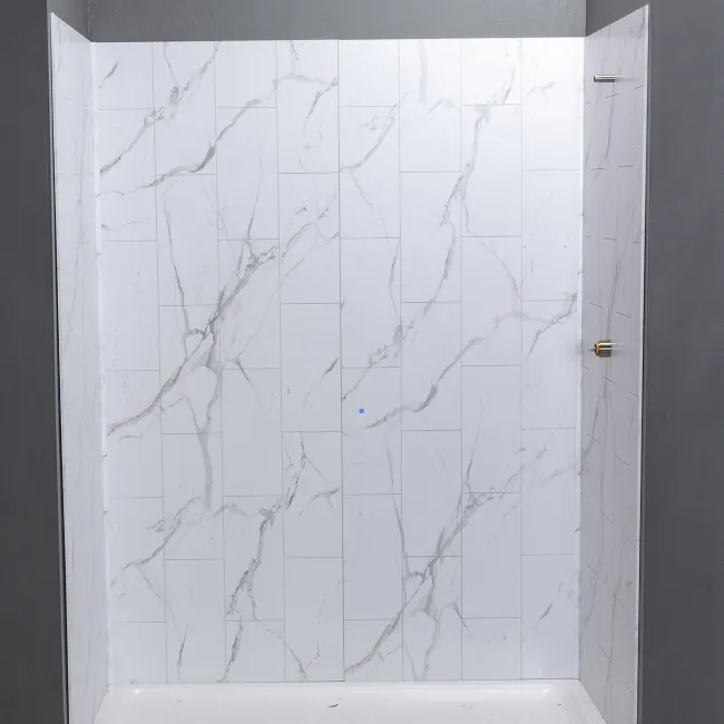 Modern shower with white marble-patterned wall tiles and simple glass door in a minimalist bathroom.