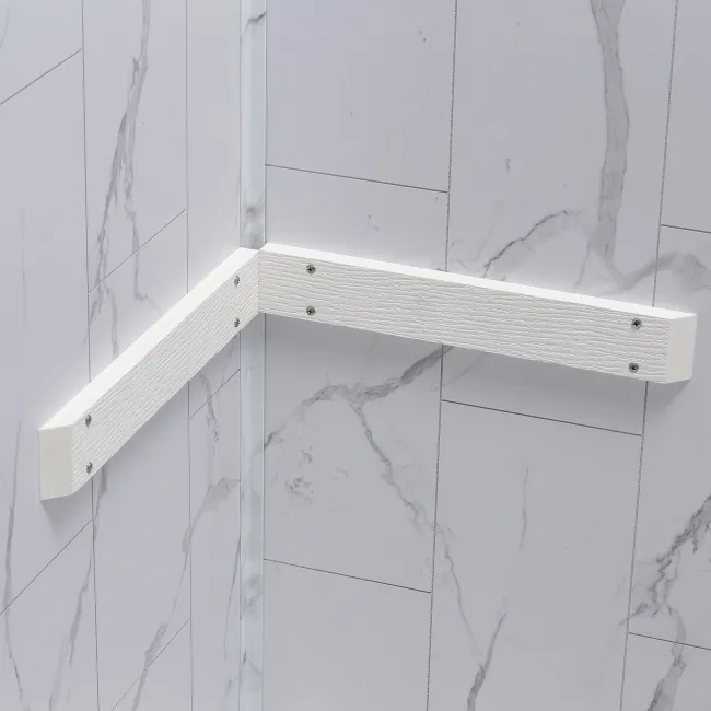 White textured corner handrails mounted on marble tiled walls for bathroom safety support.