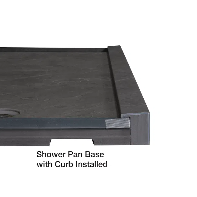 Modern dark gray shower pan base with installed curb for bathroom waterproofing and drainage.
