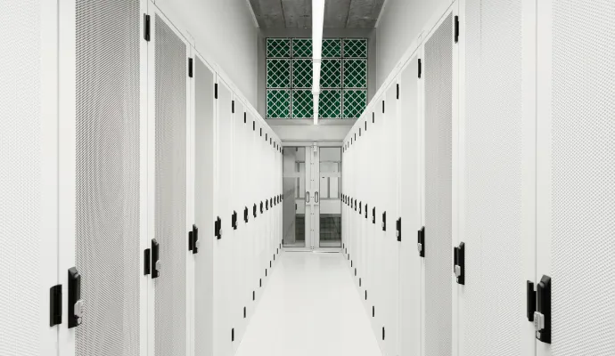 a hallway with white doors