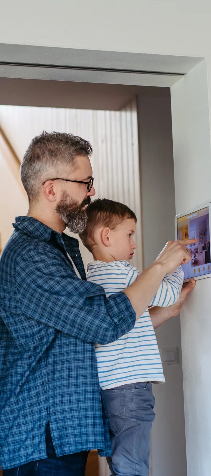 a man holding a baby