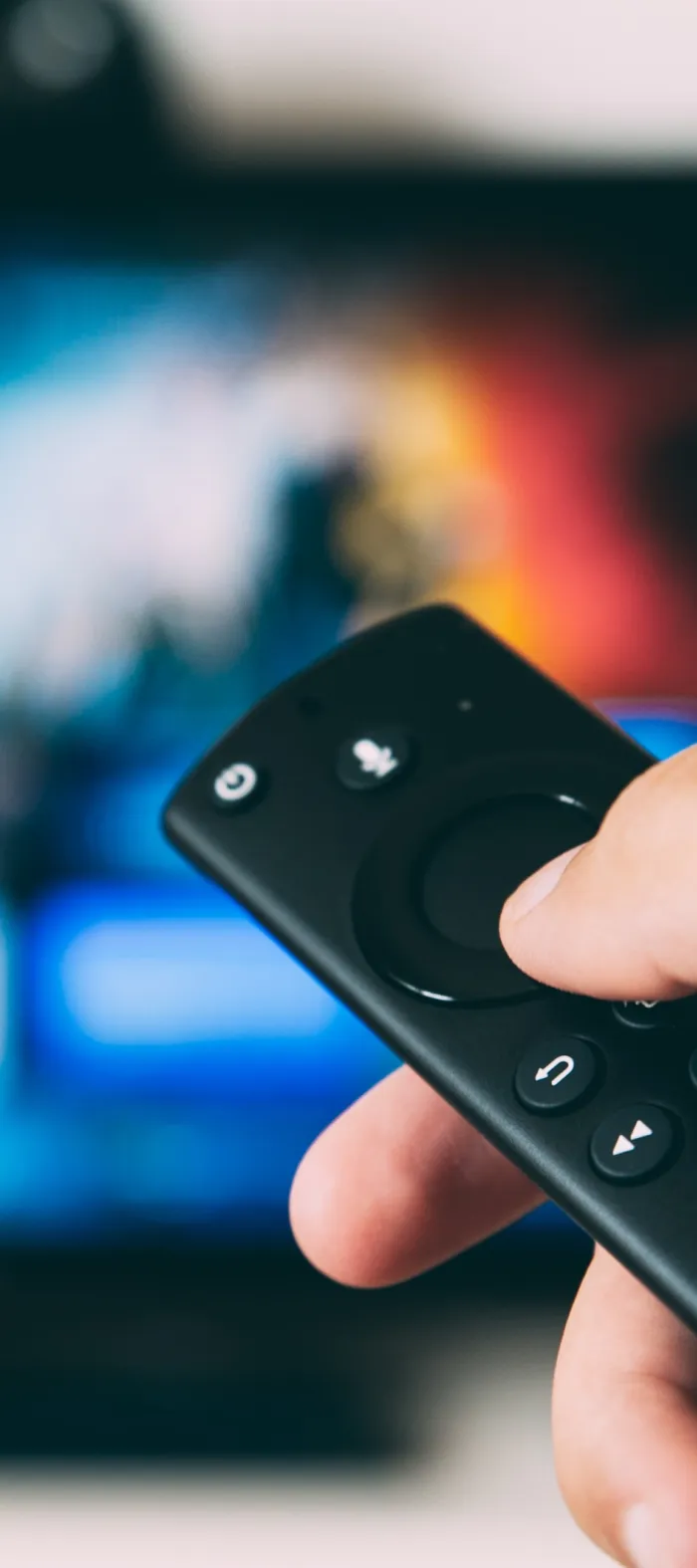 a person holding a remote control