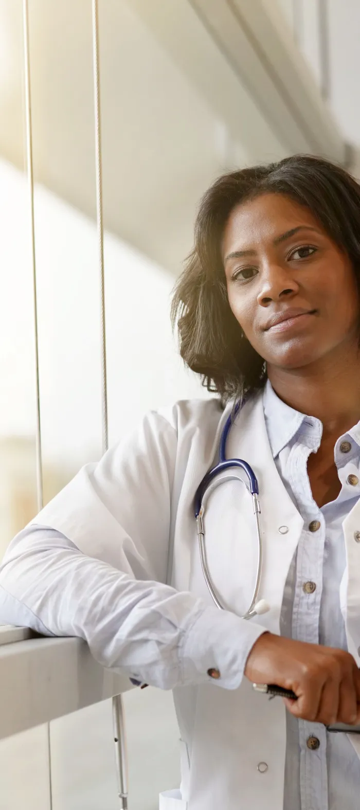 a doctor holding a clipboard